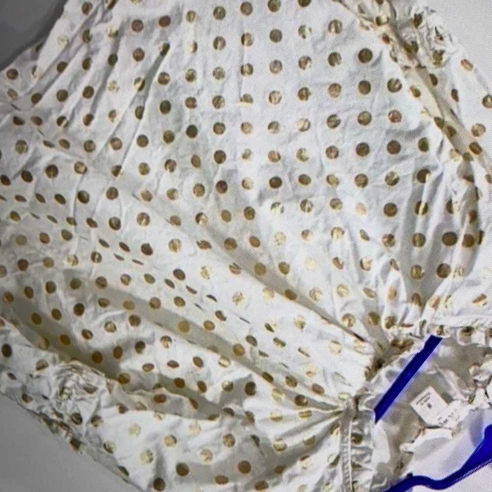 Dotted polka dot ruffle neck shirt